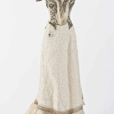 Image: J. M. Easson, Ladies' Ball Dress, Dundee, Scotland, 1892-1901. Skirt and bodice, machine and hand stitched Japanese silk, lace, silk organza, glass and metal beading and sequins, plastic pearls, diamantes, cotton lining, boning, eye hooks